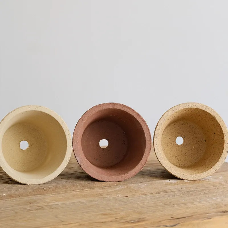 Nipots Terracotta Clay Pot - Detailed View of Drainage Hole Design for Optimal Plant Health