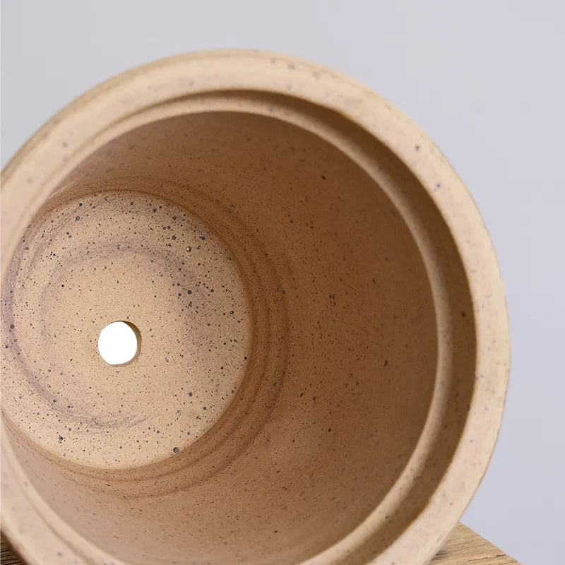 Nipots Terracotta Clay Pot - Detailed View of Drainage Hole Design for Optimal Plant Health