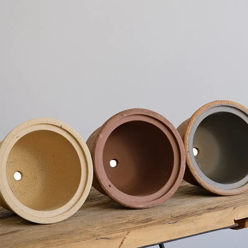 Nipots Terracotta Clay Pot - Detailed View of Drainage Hole Design for Optimal Plant Health
